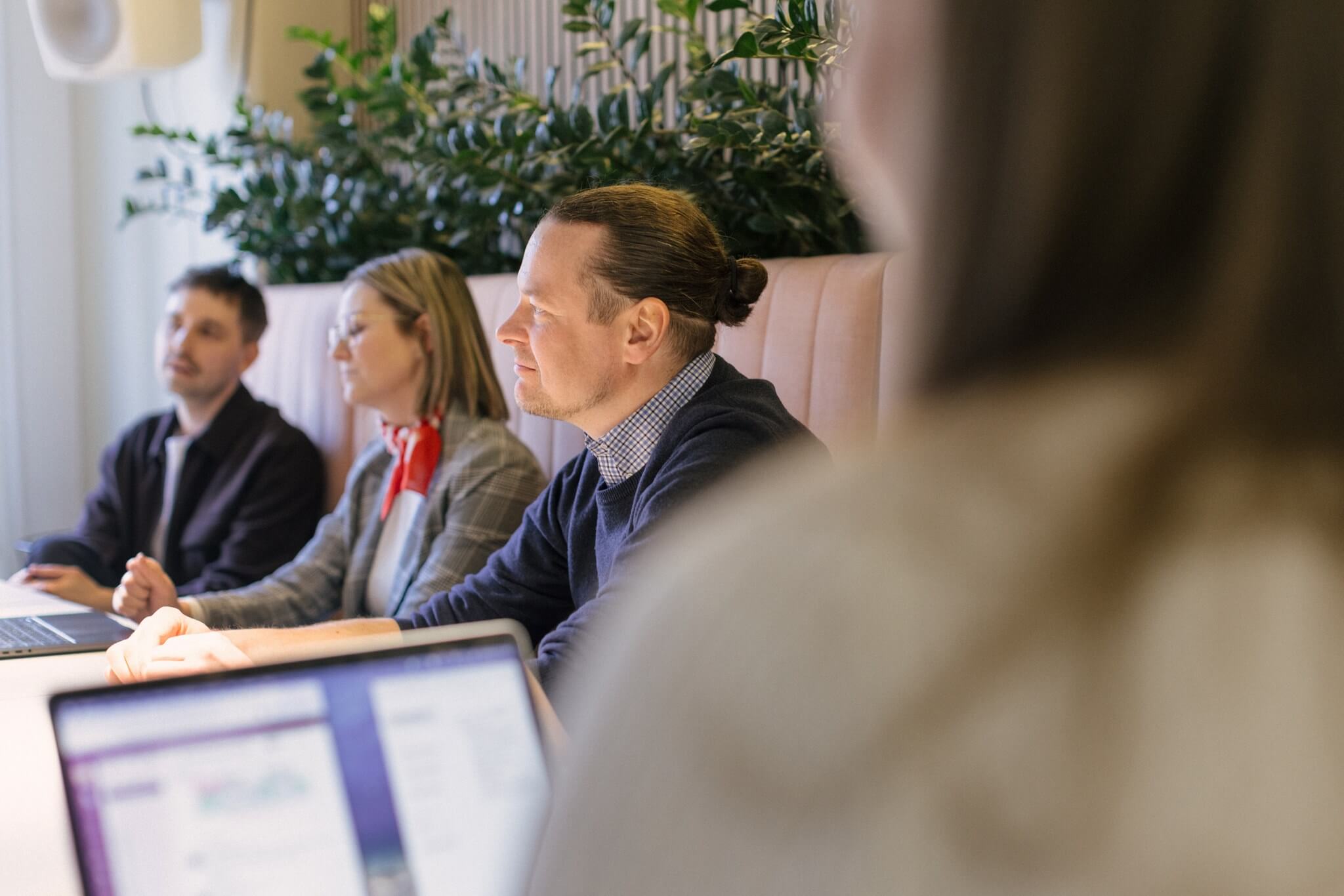 Four people working at the office