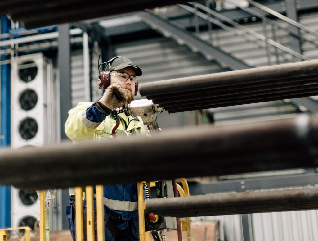 Person working in an industrial environment.