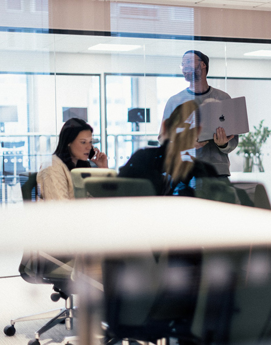 Man and woman in meeting room